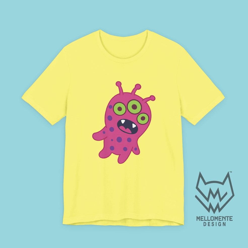 Yellow t-shirt featuring a pink alien creature on a solid background.