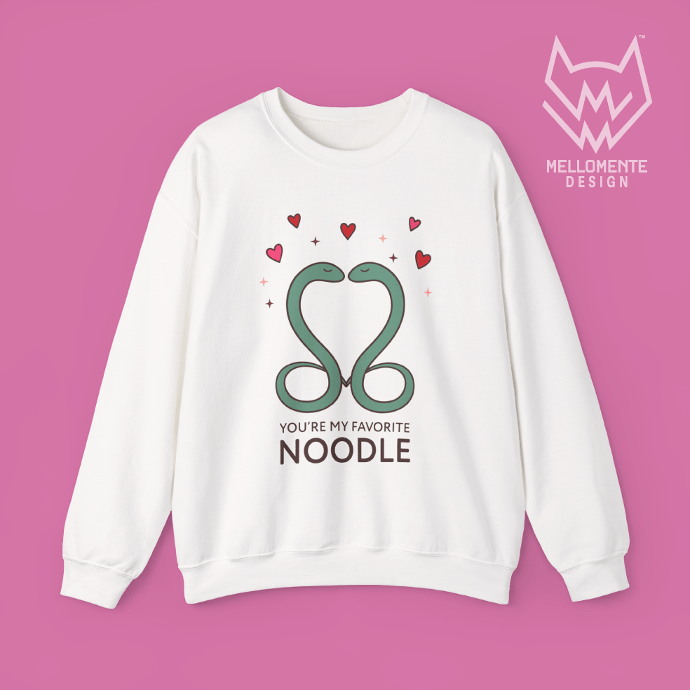 White sweater featuring a cute valentine themed snake design captioned: "You're my favorite noodle."