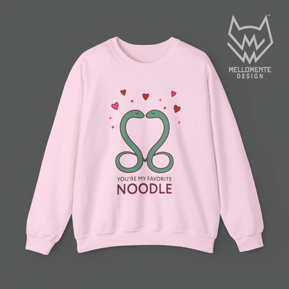 Light pink sweater featuring a cute valentine themed snake design captioned: "You're my favorite noodle."