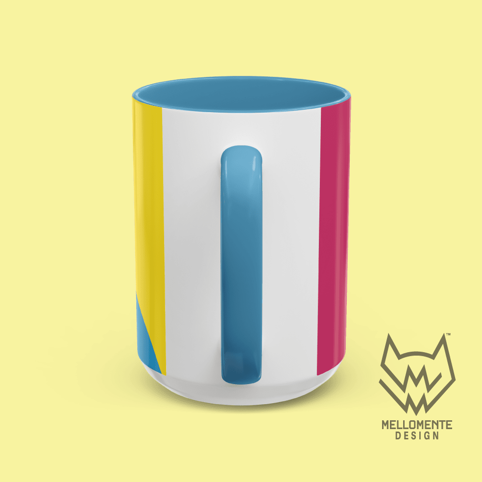 Ceramic mug with blue interior featuring colorful artwork with a pink alien creature on a solid background.