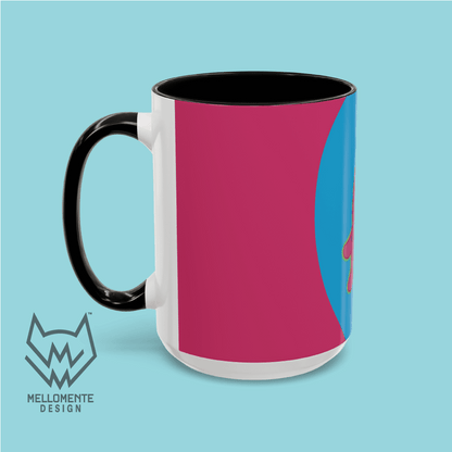 Ceramic mug with black interior featuring colorful artwork with a pink alien creature on a solid background.