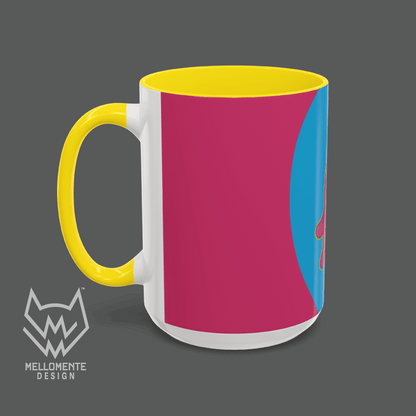 Ceramic mug with yellow interior featuring colorful artwork with a pink alien creature on a solid background.