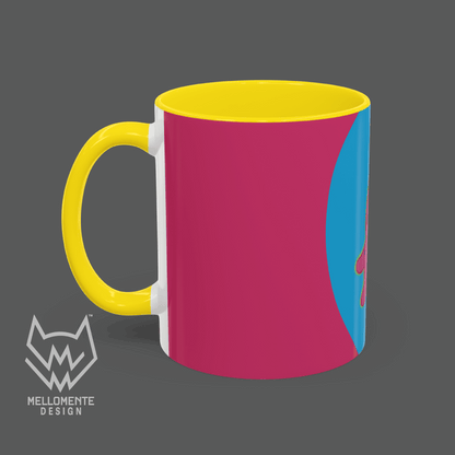 Ceramic mug with yellow interior featuring colorful artwork with a pink alien creature on a solid background.