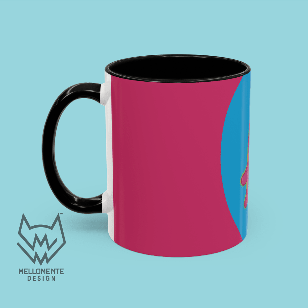Ceramic mug with black interior featuring colorful artwork with a pink alien creature on a solid background.