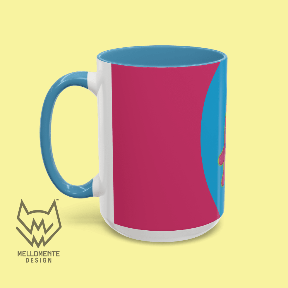 Ceramic mug with blue interior featuring colorful artwork with a pink alien creature on a solid background.