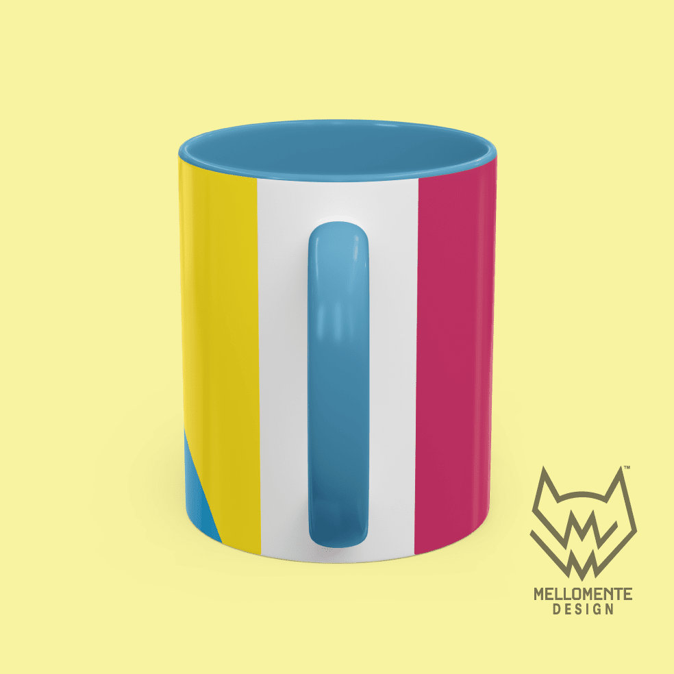 Ceramic mug with blue interior featuring colorful artwork with a pink alien creature on a solid background.