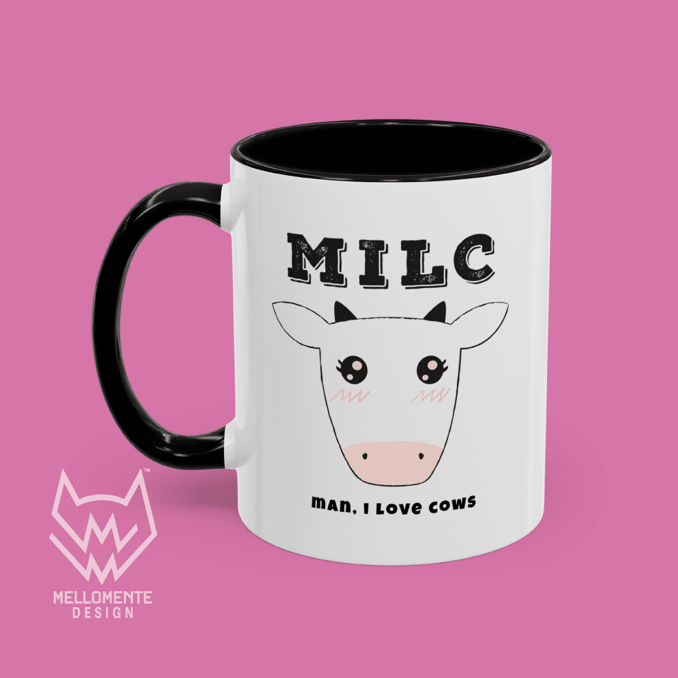 White mug with black interior featuring cow illustration and text 'MILC - Man, I love cows' on a solid background.