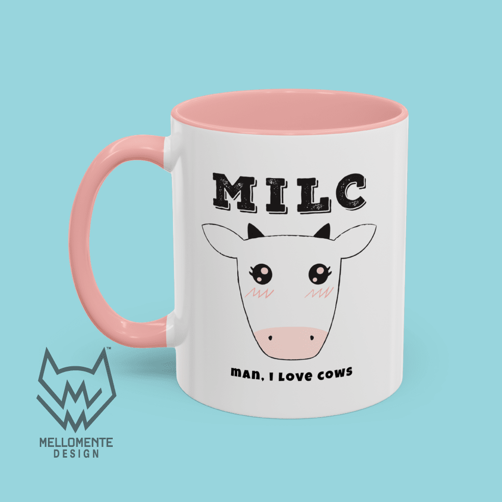 White mug with pink interior featuring cow illustration and text 'MILC - Man, I love cows' on a solid background.